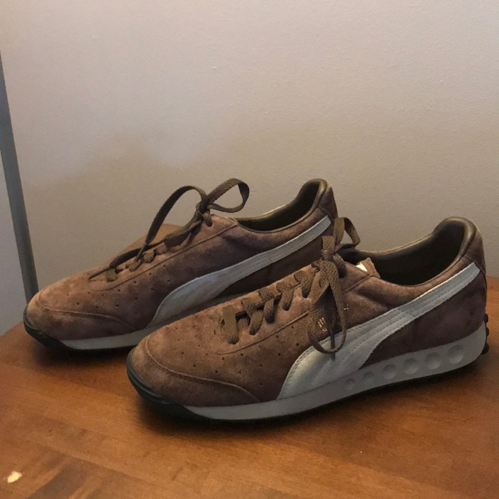 Women’s 8.5 brown suede Pumas